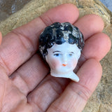 “Katrina’s Tiny Head“