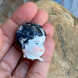 “Katrina’s Tiny Head“